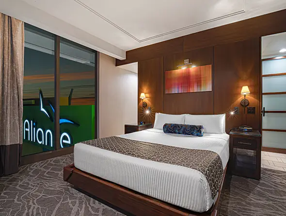 Aliante Executive Suite bedroom with a king bed