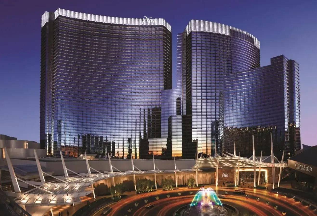 a group of tall buildings in a city at night at ARIA Resort & Casino in Las Vegas