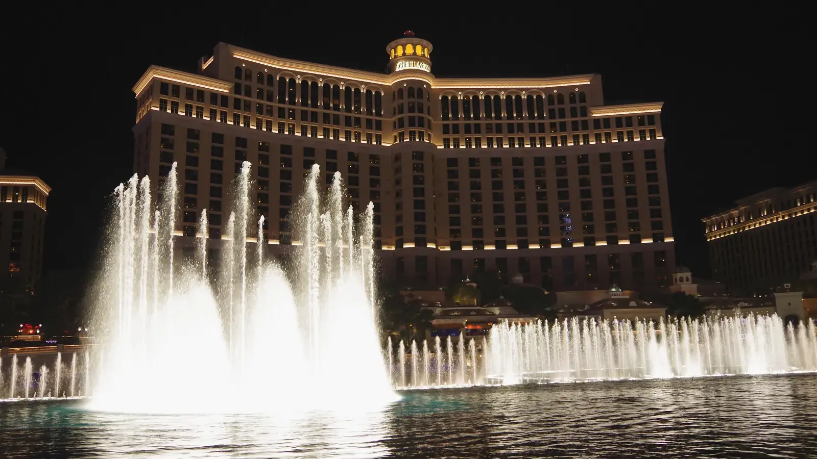 The Fountains of Bellagio in front of the Bellagio hotel at night