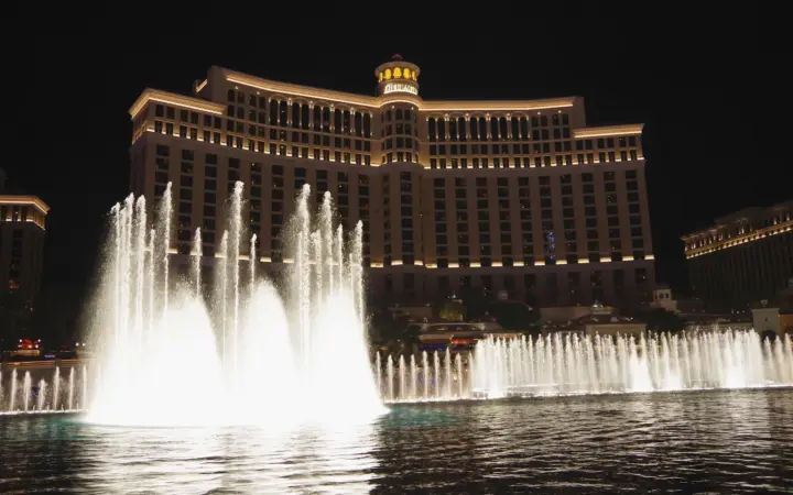The Fountains of Bellagio in front of the Bellagio hotel at night