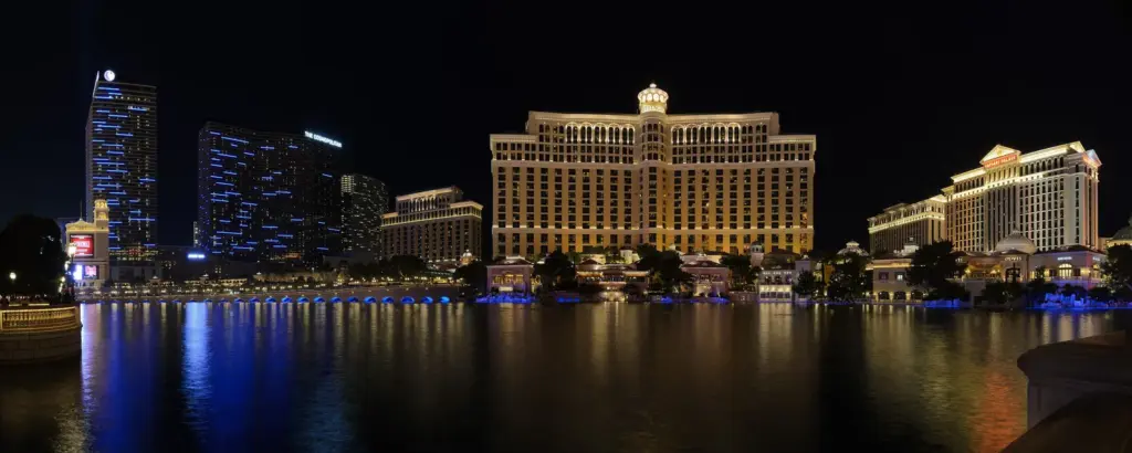 Night panorama of the Cosmopolitan, Bellagio and Caesars Palace across Lake Bellagio
