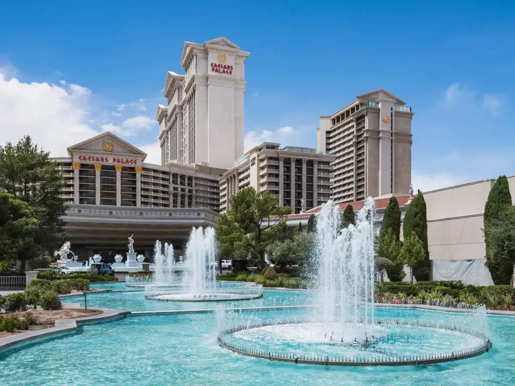 Caesars Palace towers behind its fountains and gardens on the Strip