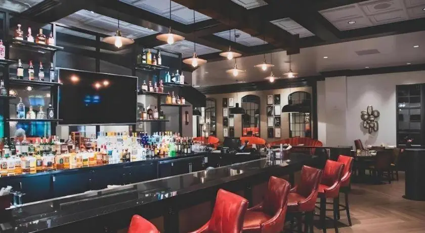 Bar counter and red seating at Cannery Casino Hotel