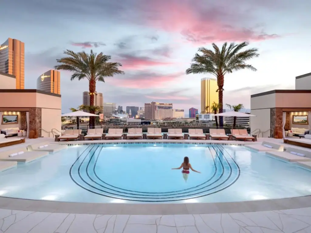 Outdoor pool deck shown in the Conrad at Resorts World property gallery