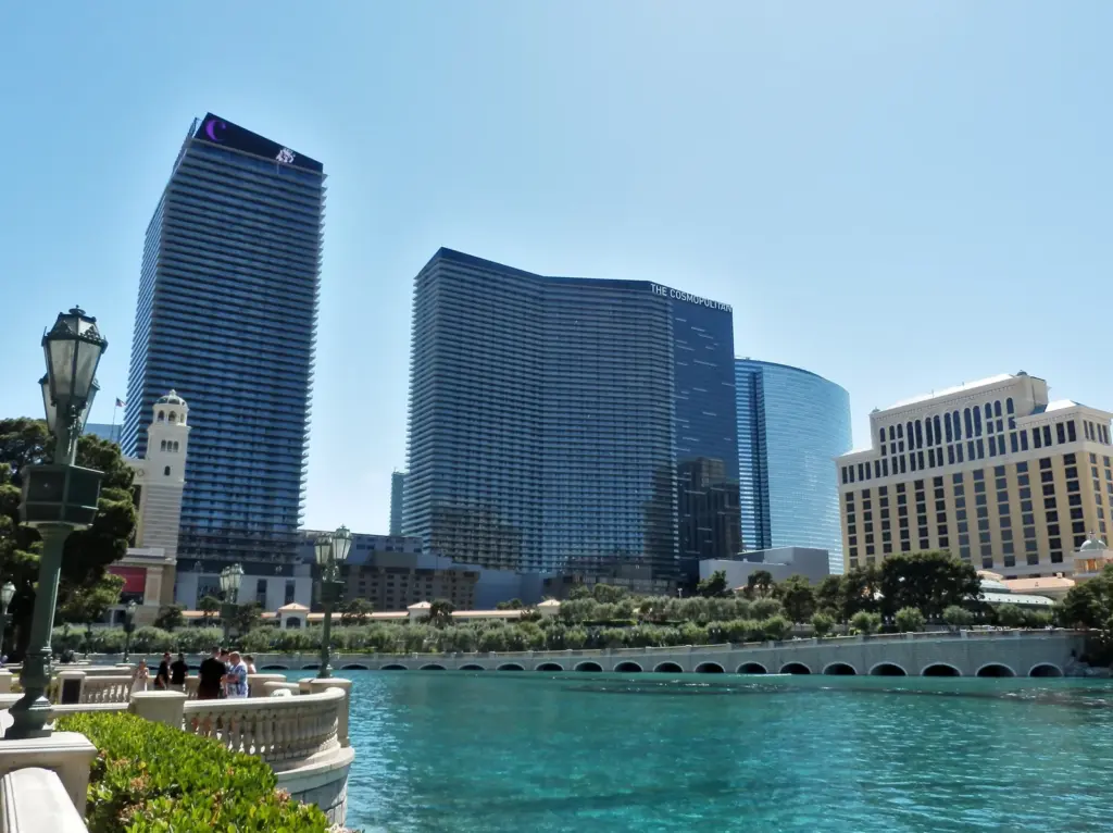The Cosmopolitan's towers next to Bellagio and its lake on the Las Vegas Strip