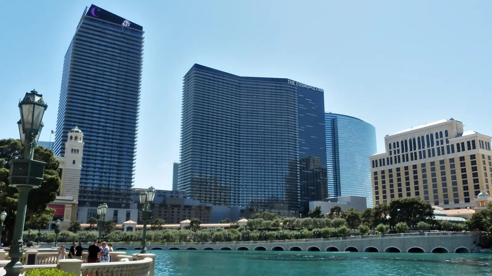 The Cosmopolitan's towers next to Bellagio and its lake on the Las Vegas Strip
