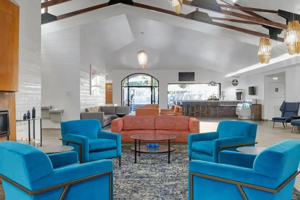 Desert Rose Resort lobby with blue seating