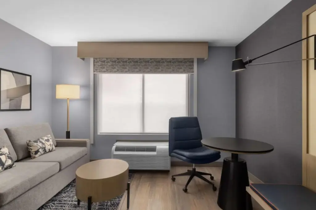 a living room with a couch and a table at DoubleTree by Hilton Las Vegas Airport in Las Vegas