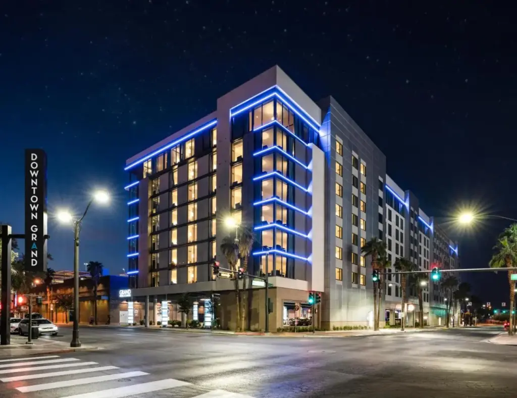 a building with blue lights on the side of a street at Downtown Grand Hotel & Casino in Las Vegas