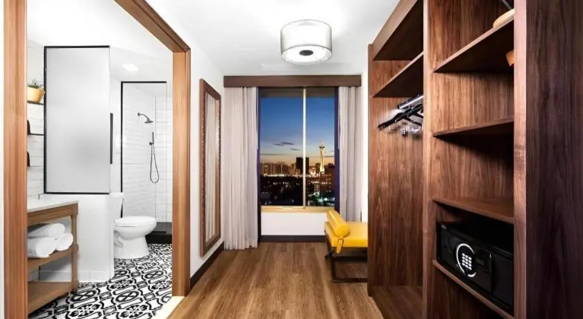 a bathroom with a toilet and a view of a city at El Cortez Hotel & Casino - 21 and over only in Las Vegas