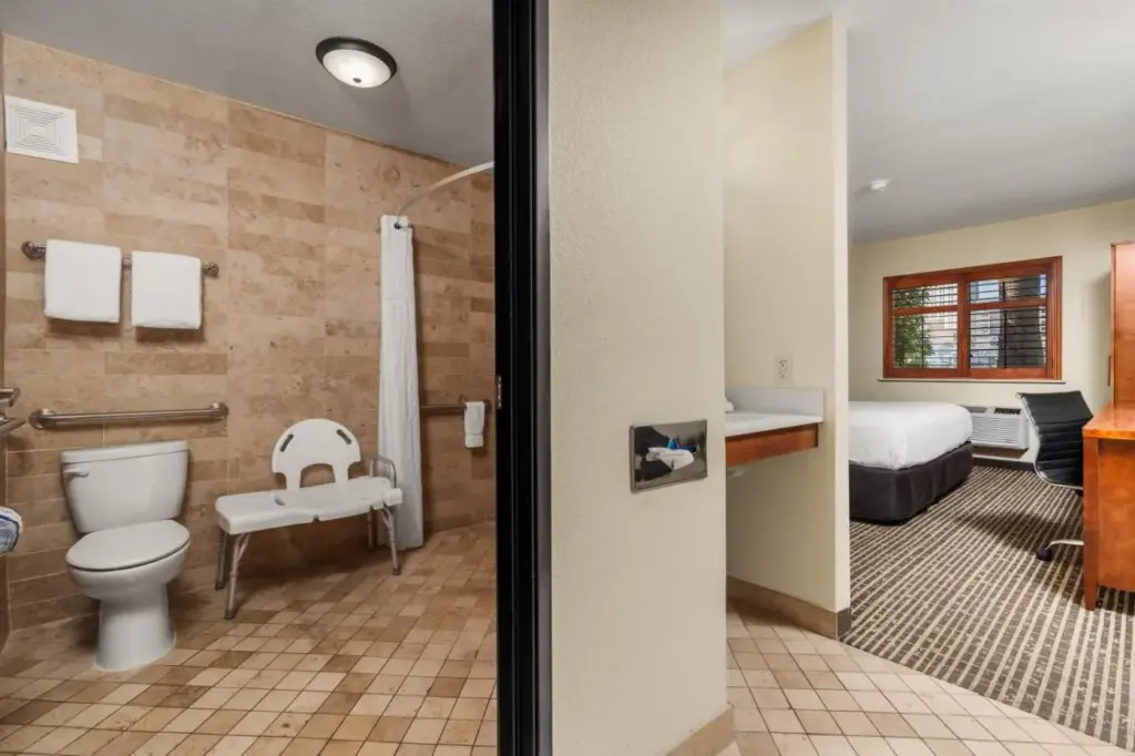 Bathroom and adjoining guest room at Ellis Island