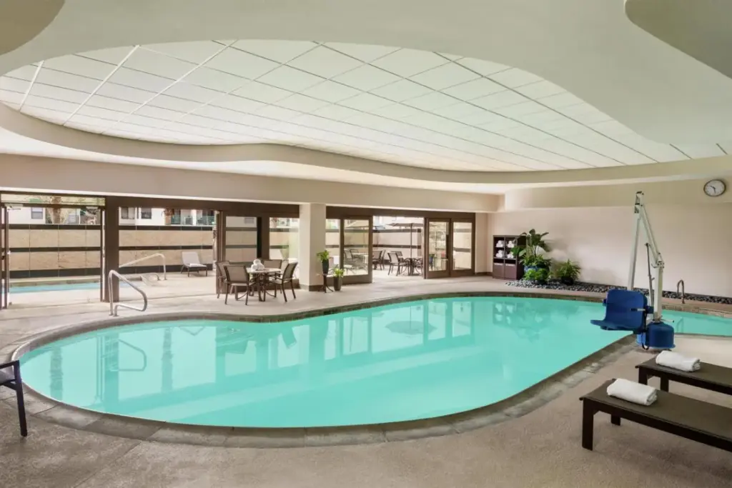 a large swimming pool in a building with a large ceiling at Embassy Suites by Hilton Convention Center Las Vegas in Las Vegas