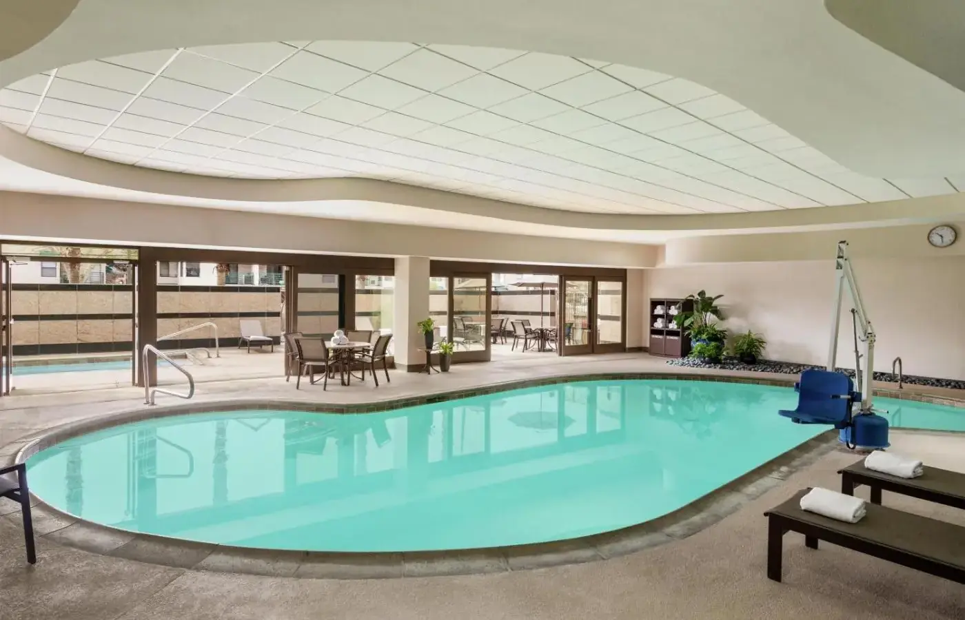 a large swimming pool in a building with a large ceiling at Embassy Suites by Hilton Convention Center Las Vegas in Las Vegas