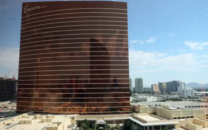Encore Las Vegas hotel tower under a blue sky