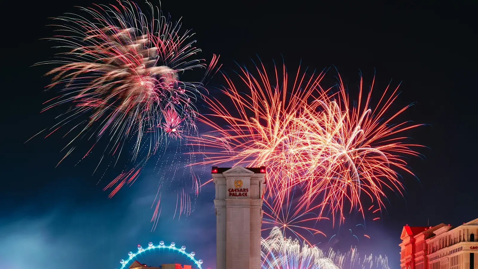 Fireworks over Caesars Palace and the High Roller on the Las Vegas Strip