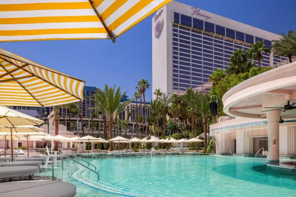 a swimming pool with umbrellas and a resort at Flamingo Las Vegas Hotel & Casino in Las Vegas