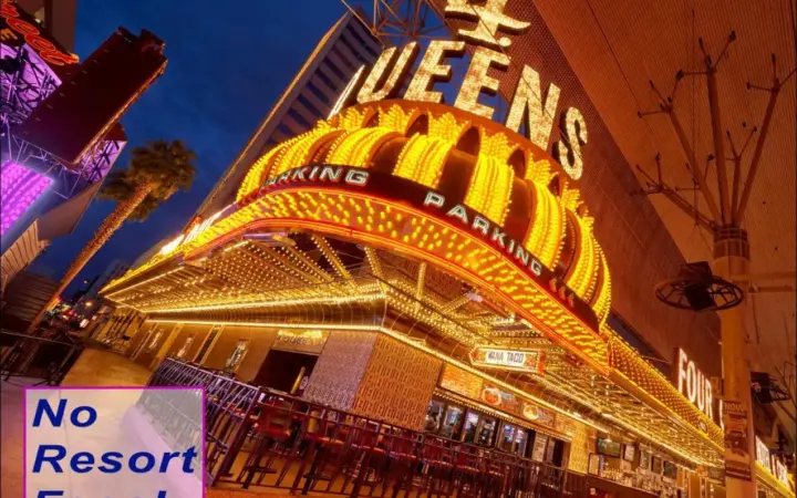 a building with a no restart fee sign in front of it at Four Queens Hotel and Casino in Las Vegas