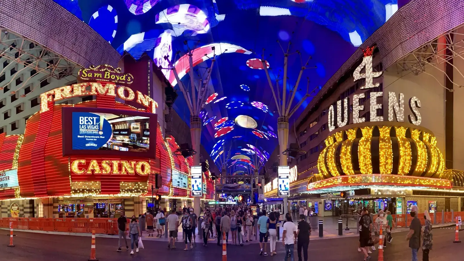 Fremont and 4 Queens neon signs under the Fremont Street canopy at night