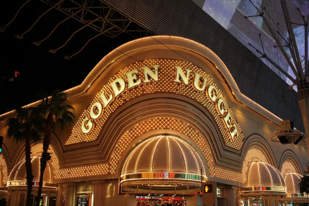 Golden Nugget facade glowing at night on Fremont Street