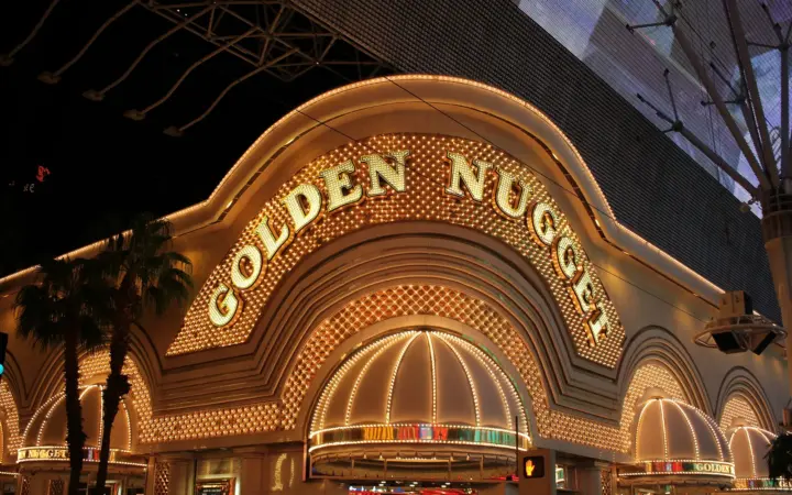 Golden Nugget facade glowing at night on Fremont Street