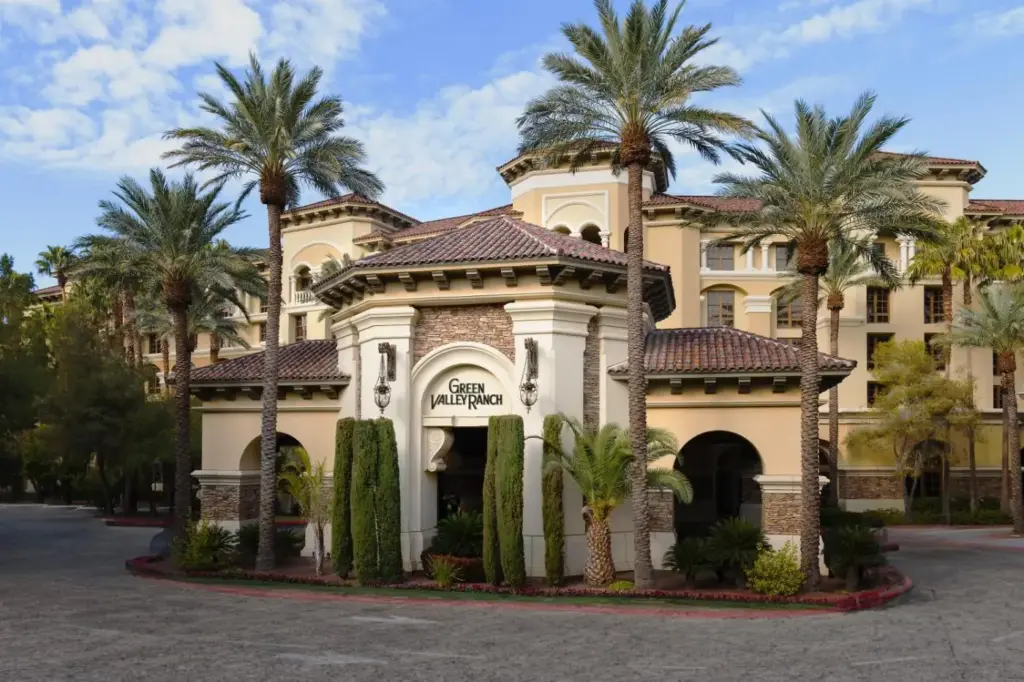 a building with palm trees in front of it at Green Valley Ranch Resort Spa Casino in Las Vegas