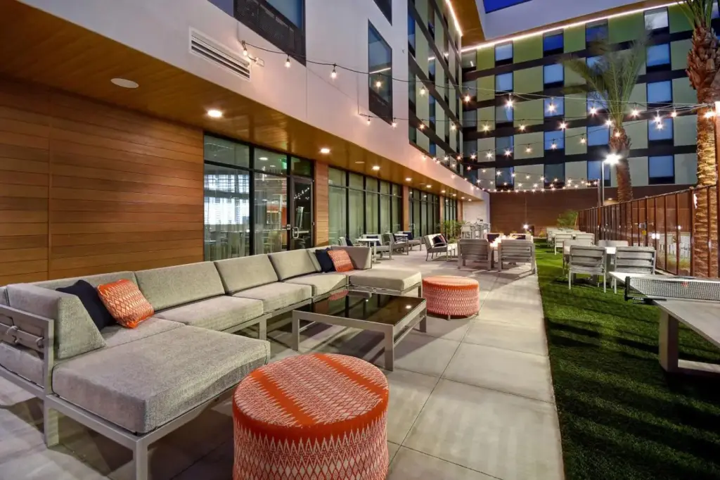 a lobby with couches and chairs in a building at Hampton Inn & Suites Las Vegas Convention Center - No Resort Fee in Las Vegas