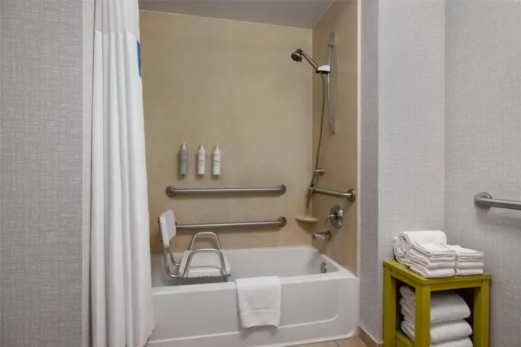 a bathroom with a tub and a shower at Hampton Inn Las Vegas/North Speedway in Las Vegas