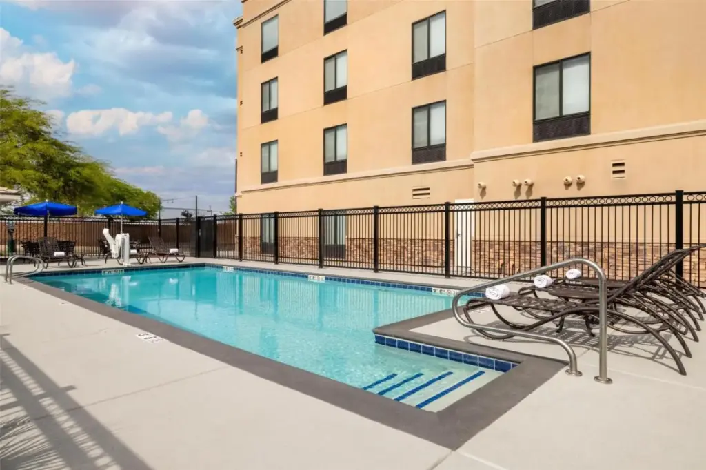 a swimming pool in front of a building at Hampton Inn Las Vegas/North Speedway in Las Vegas