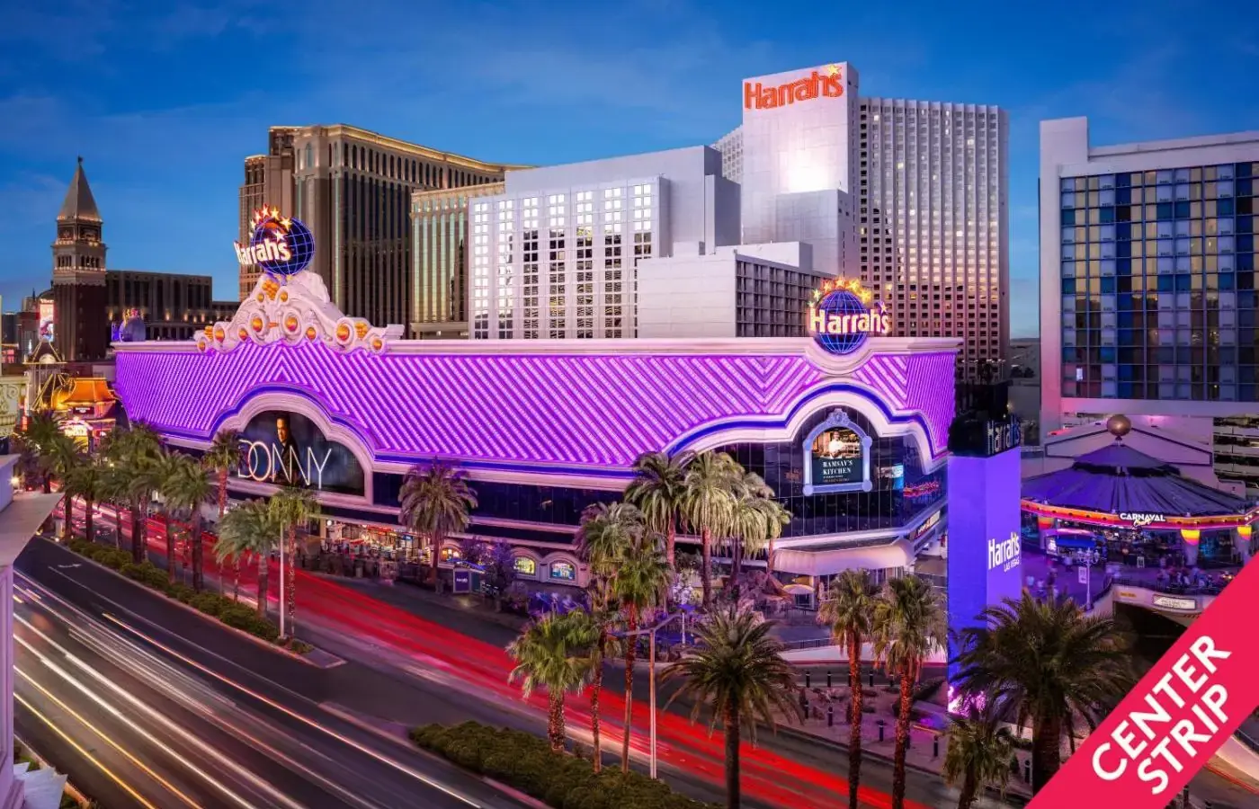 a view of the las vegas strip at night at Harrah's Las Vegas, A Caesars Destination in Las Vegas