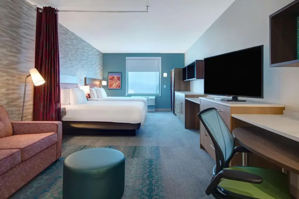 Example sleeping and sitting area at Home2 Suites Las Vegas North