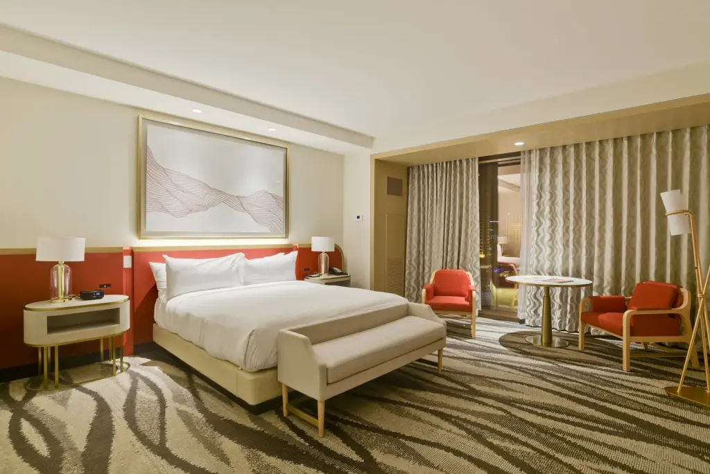 Bright king hotel room at Conrad Las Vegas at Resorts World