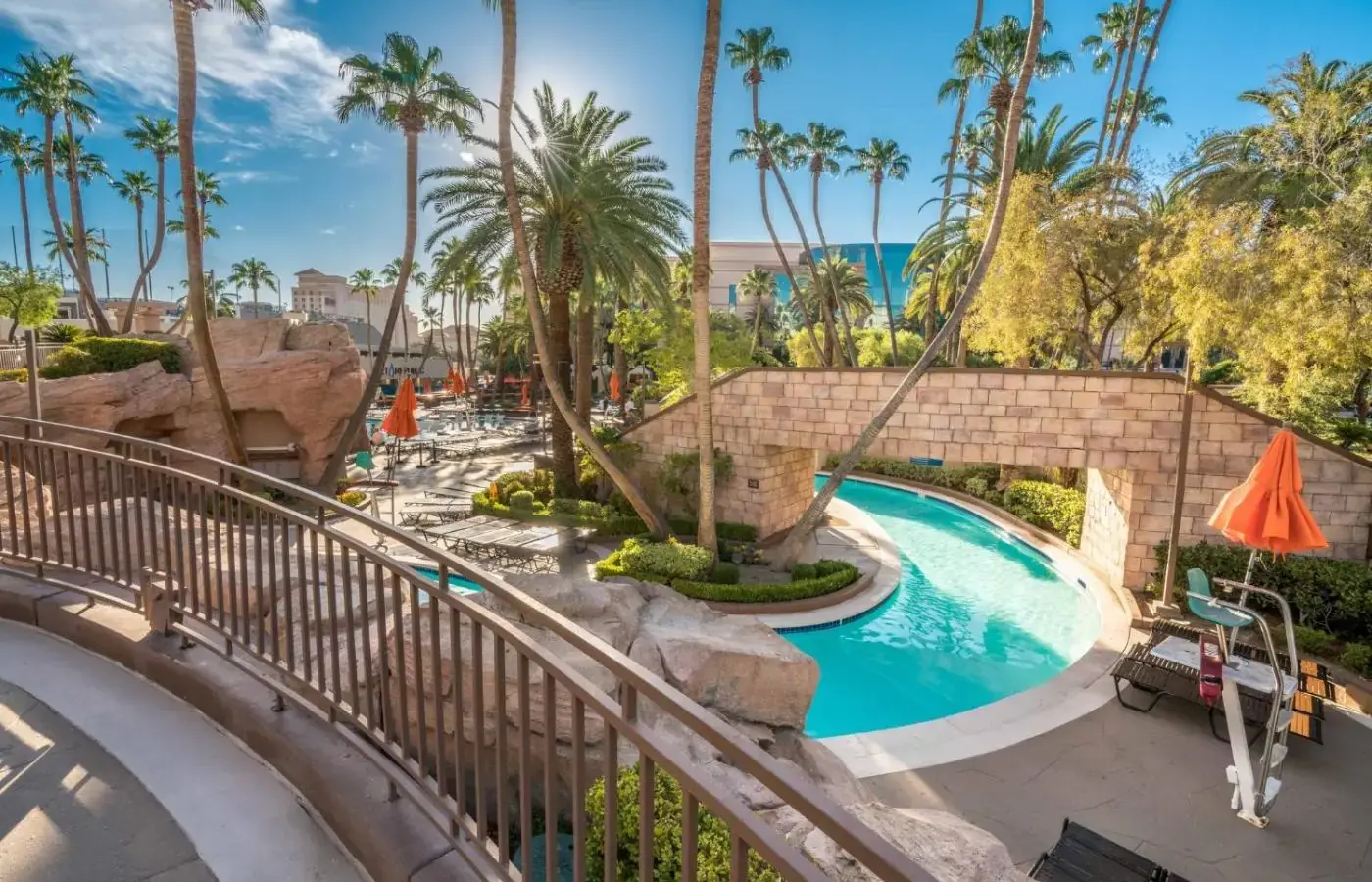 a view of a pool at a resort with palm trees at MGM Grand in Las Vegas