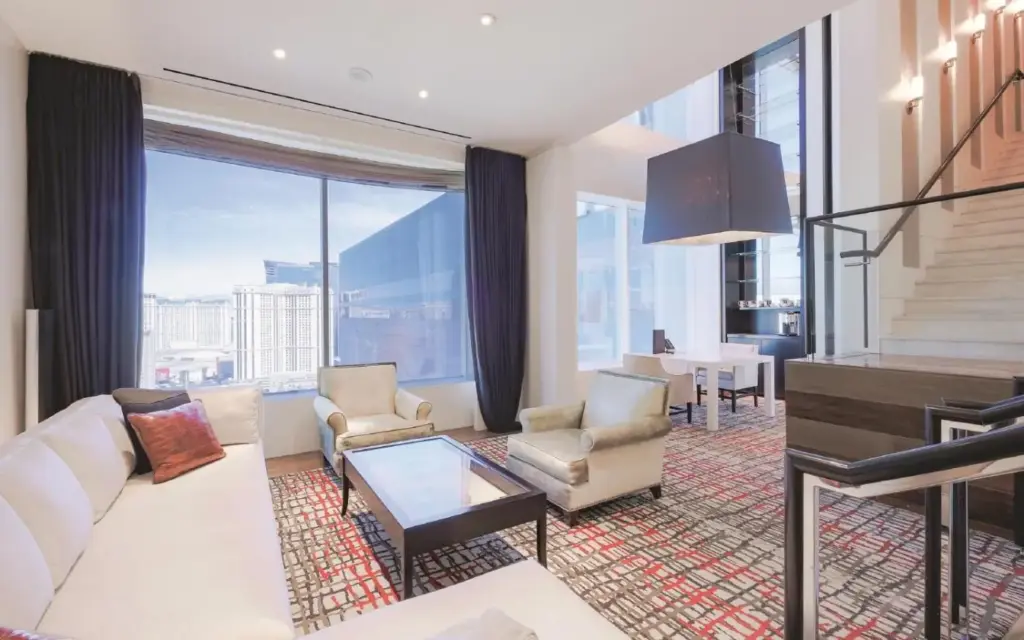 MGM Grand suite living area with a sofa and large windows