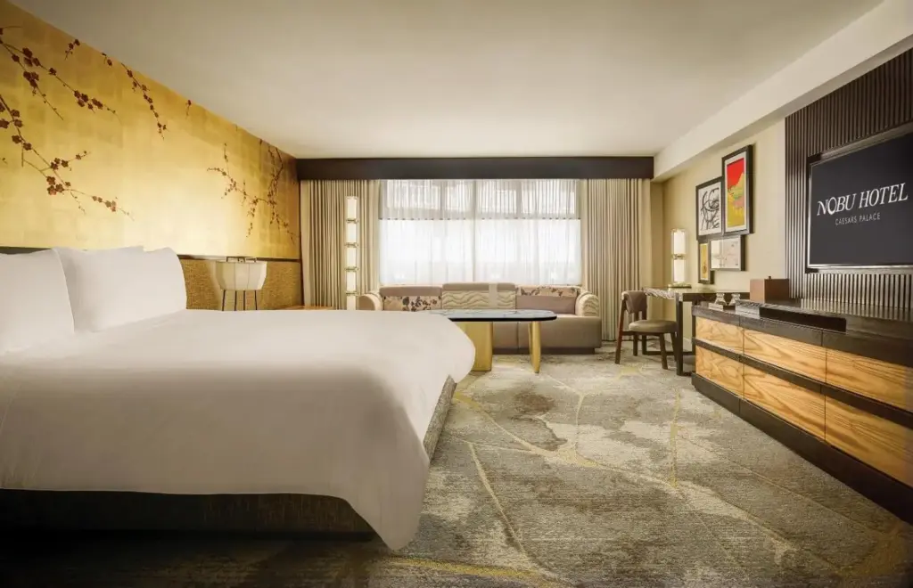 a hotel room with a bed and a television at Nobu Las Vegas, A Caesars Destination in Las Vegas