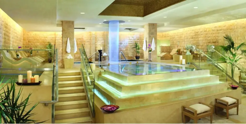 a lobby with stairs and a swimming pool at Nobu Las Vegas, A Caesars Destination in Las Vegas
