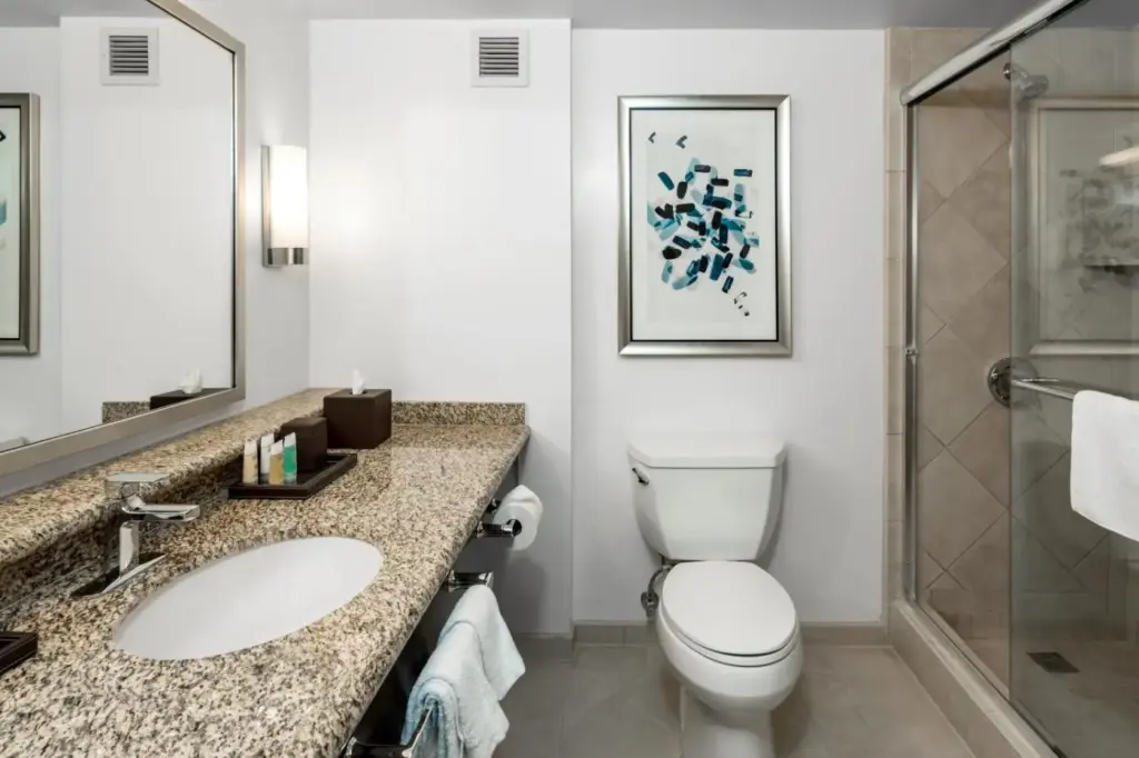 a bathroom with a toilet and a sink and a shower at Palace Station Hotel & Casino in Las Vegas