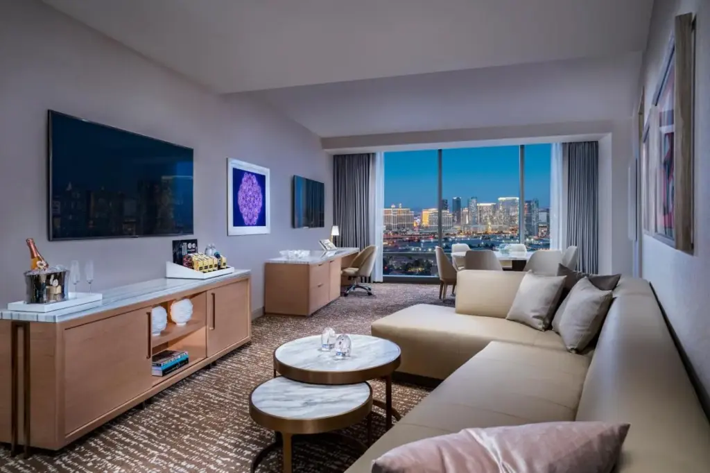 a living room with a couch and a tv at Palms Casino Resort in Las Vegas