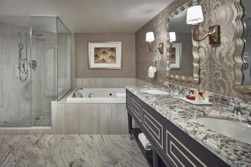 a bathroom with a tub and a sink and a shower at Paris Las Vegas Hotel & Casino in Las Vegas