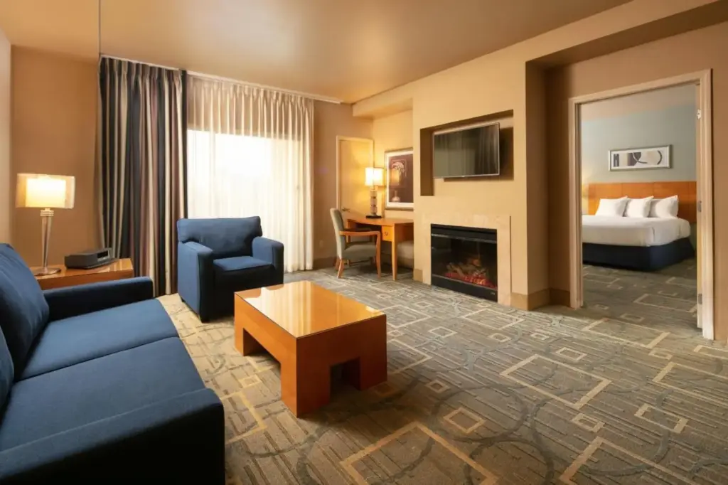 Example living area and separate bedroom at The Platinum Hotel