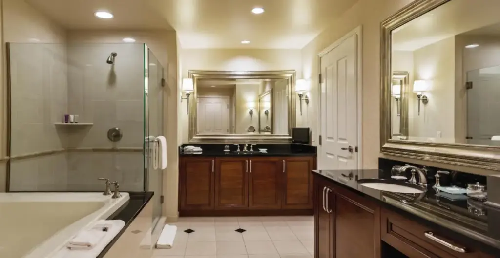 a large bathroom with a tub and a sink at The Signature at MGM Grand - All Suites in Las Vegas