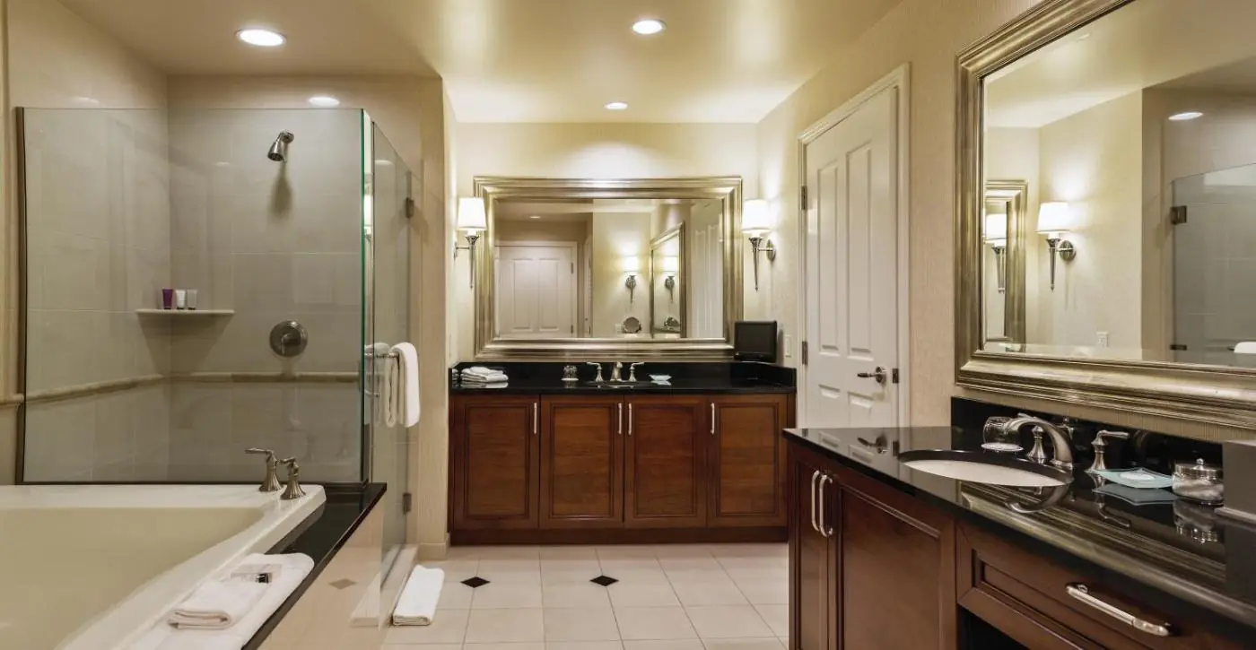 a large bathroom with a tub and a sink at The Signature at MGM Grand - All Suites in Las Vegas