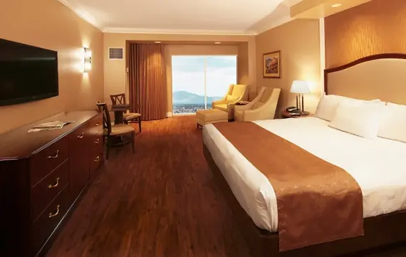 South Point guest room with a king bed