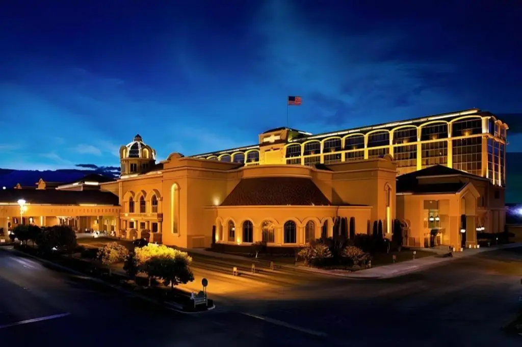 a large building with a flag on top of it at Suncoast Hotel and Casino in Las Vegas