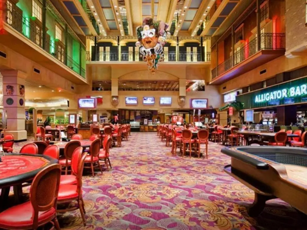 a restaurant with tables and chairs in a mall at Orleans Hotel and Casino in Las Vegas