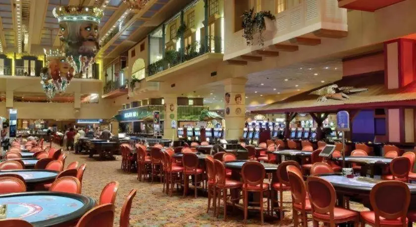 a restaurant with tables and chairs in a building at Orleans Hotel and Casino in Las Vegas