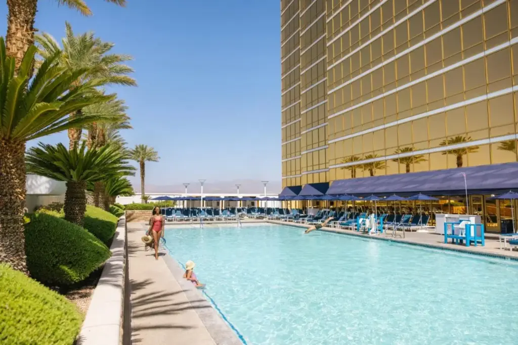 a pool at a hotel with people playing in it at Trump International Hotel Las Vegas in Las Vegas