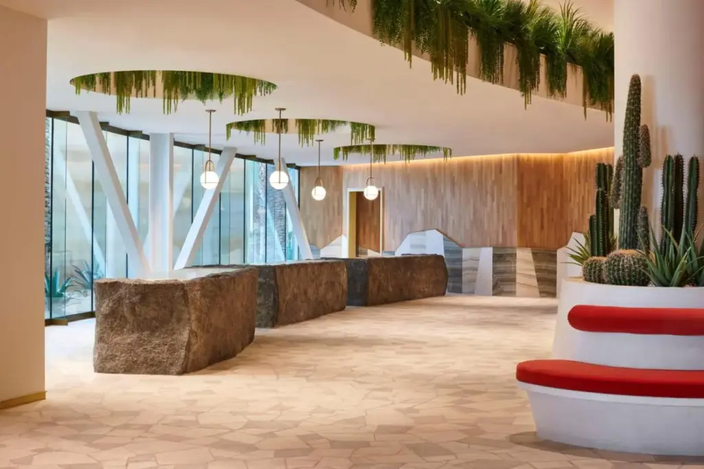 a lobby with cactuses and plants in a building at Virgin Hotels Las Vegas, Curio Collection by Hilton in Las Vegas