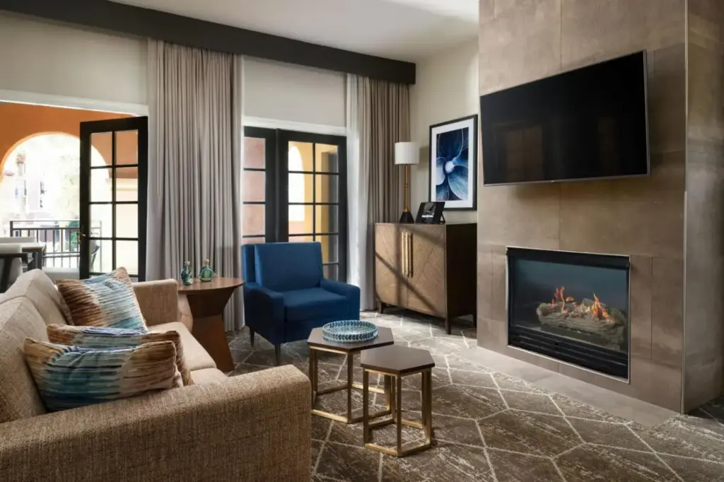 Example Westin Lake Las Vegas suite living area with a fireplace